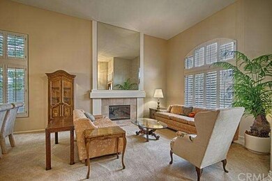 The gas fireplace and custom mirror add to the ele
