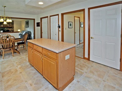 Lots of storage in Kitchen.  First floor laundry t