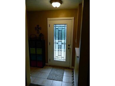Exterior Front. entry with coat closet, ceramic an