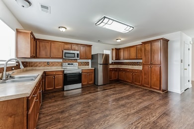 Kitchen with appliances with stainless steel finis