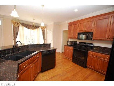 Kitchen - Sunny eat-in kitchen with bay window wit