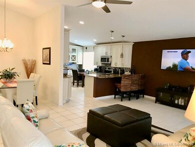 Cozy and expansive dining/family/living/kitchen ar