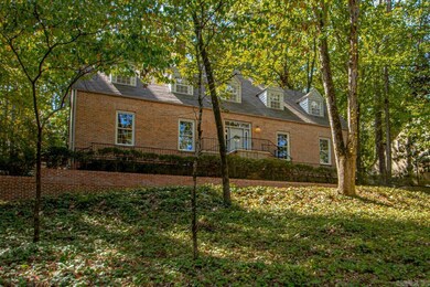 Brick walkway w/iron railing to entry-circle drive