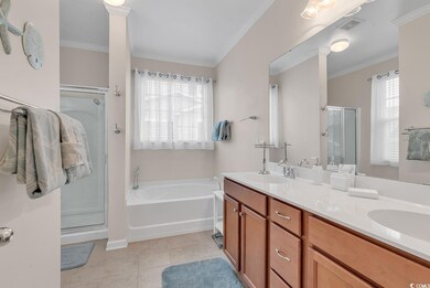 Bathroom with dual vanity, separate shower and tub