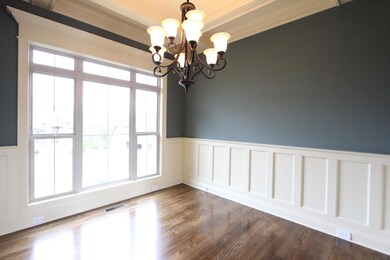 Formal Dining Room With Custom Trim Work