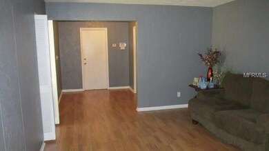 Living Room looking into foyer.