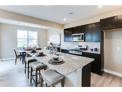 The popular Edmon floor plan, with a shining star of a kitchen! *Model photo, selections and colors may vary!
