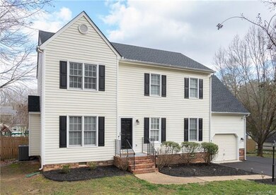 MAINTENANCE FREE VINYL SIDING AND A FRESHLY PAVED 
