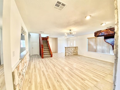 Unfurnished living room with a textured ceiling, 