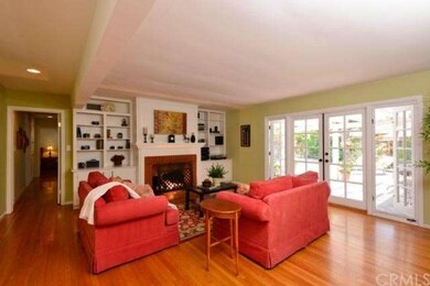 Cozy living room with French doors that open to a 