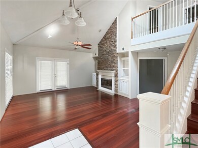 Light-filled Great Room overlooks Back Patio.