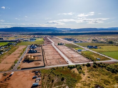 Overview of rural landscape featuring a mountainous background