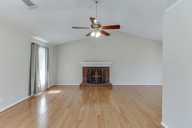 Unfurnished living room with visible vents, light 