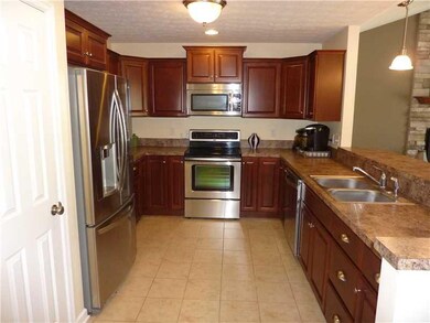 Kitchen. The gourmet kitchen affords beautiful che