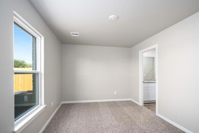 Spacious master suite with tons of natural light!