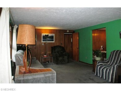 Living Room greets you with newer gray tone carpet