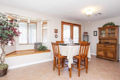 Dining Room w/Bay Window & French Doors