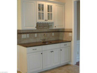 Wet Bar area with granite counter top, accent ligh