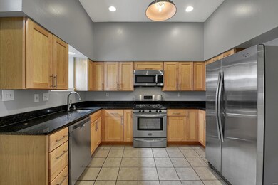 Uba Tuba granite countertops, recessed lighting