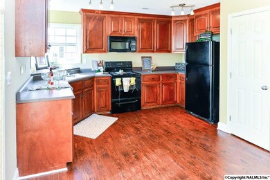 Storage and more storage with pantry in addition to numerous cabinets.