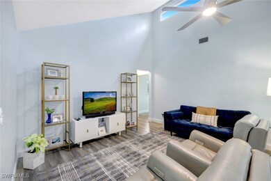 Living room with hardwood / wood-style flooring, c