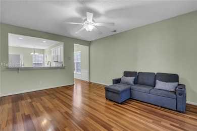 Living room featuring hardwood / wood-style floors