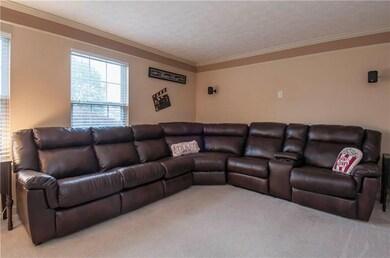 Media room separate from the family room space.