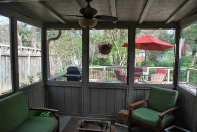 Cozy screened porch off dining area leading to hug