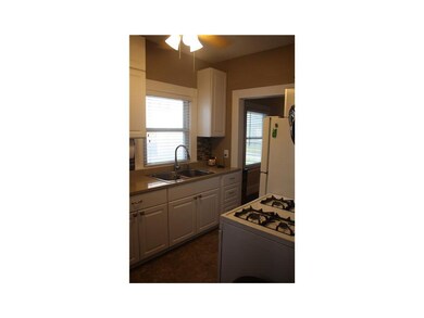 Kitchen. Kitchen leading into the dining area and 