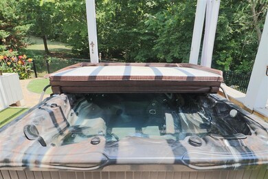 Hot tub remains.  2 yrs old.  $8000 tub brand new.