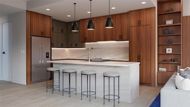 Kitchen featuring open shelves, pendant lighting, brown cabinets, high quality fridge, and recessed lighting