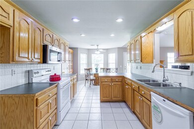 Kitchen with Breakfast area and Bar.