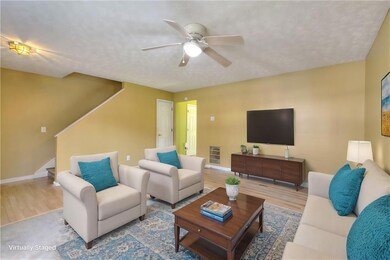 Virtually Staged Living room featuring a ceiling f