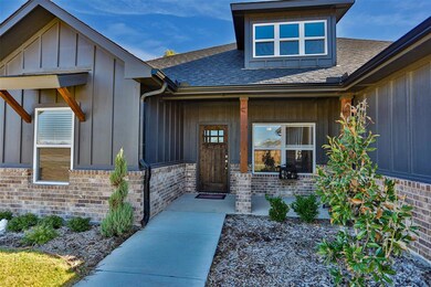 Adorable front porch and attractive landscaping