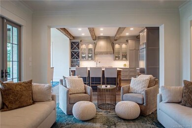 Representative Photo of Great Room opening up to K