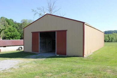 72x40 Shop/Barn (built in 1999) with room for 2000 bales in loft, Wash Room, Tack Room, 5 stalls (12x14), Separate Electrical Service