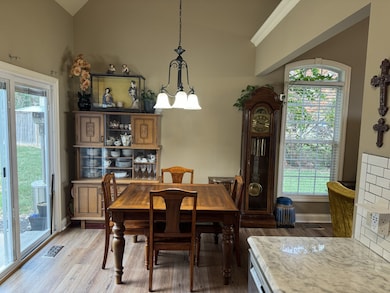 Eat in kitchen includes brand new floors and lights.  Check out the ton of light that floods in as you are having your morning coffee.