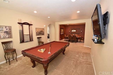 Game room view to formal dining area