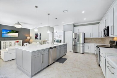 large all white kitchen with 2 pantries