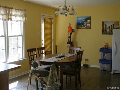 Dining area with door leading to large rear deck!