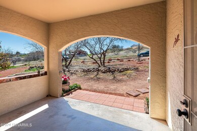Covered front patio looking to front yar
