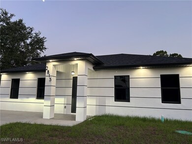 View of property exterior with roof with shingles and stucco siding