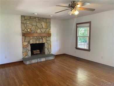 Inviting Living room with stone fireplace