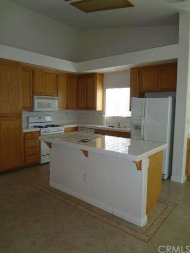 Open concept kitchen with center island with count
