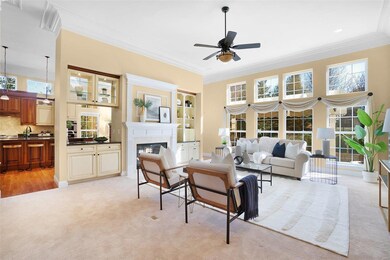 living room with wet bar and fireplace.