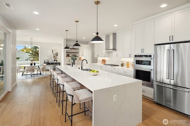 14 foot kitchen Island with 3cm slab quartz waterfall ends