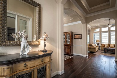 Foyer view into the family room and dining room