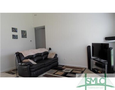 Living Room. LIVING ROOM FEATURES CEILING FAN.