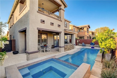 View of pool with a fenced backyard, a patio area,