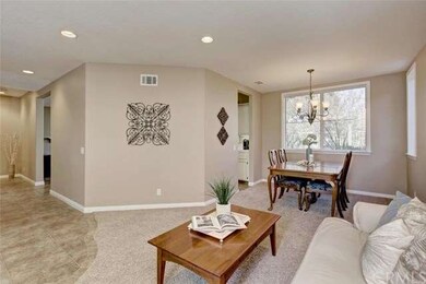 Formal living and dining rooms greet you upon entr